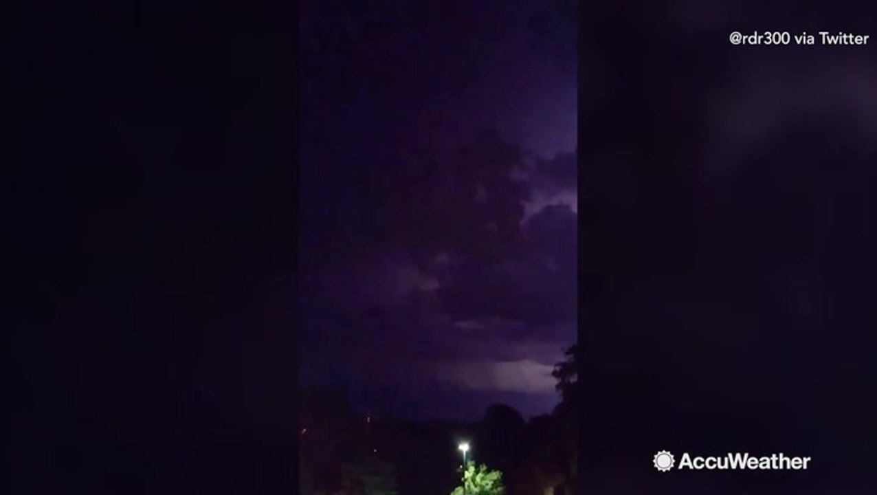 Lightning bolts streak through the sky