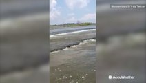 Floodwaters overtake road in Iowa