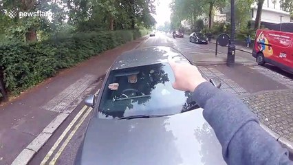 London police arrive at scene after cyclist goes face-to-face with furious driver