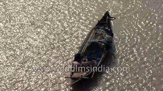 How to row a hand made fishing boat | other local cargos and fishing boats in West Bengal, 4k Aerial stock footage