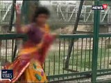 VIRAL VIDEO: बीच सड़क पर नशे में धुत महिला का ड्रामा
