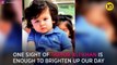 Taimur Ali Khan hangs on to dad Saif Ali Khan in this viral photo