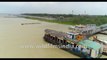 Kakdwip to Gangasagar local ferry, River Hooghly meeting the Bay Of Bengal, West Bengal, India. 4k Aerial stock Footage.