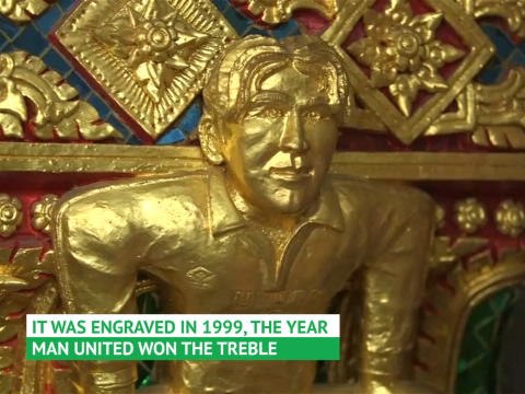 David Beckham statue draws tourists to Buddhist temple