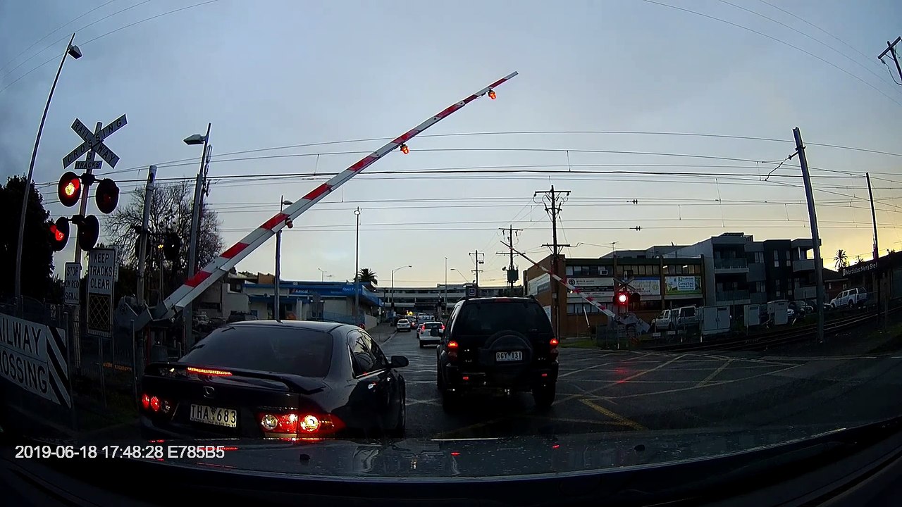 Car Gets Caught Under a Gate