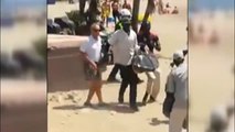 Los manteros ya no huyen, plantan cara a la Policía en la playa de Marbella