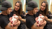 Karan Singh Grover and Bipasha Basu hold cute baby in her arms; Check out | FilmiBeat