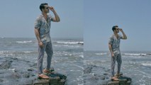 Varun Dhawan enjoys the rainy season at the beach | FilmiBeat