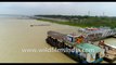 4K birds eye view , Aerial shoot of the Hooghly River meeting the Bay of Bengal, Kakdwip, Gangasagar, West Bengal, India.  Stock Footage.