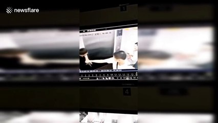 Elevator doors crash open after man one-inch punches them in China