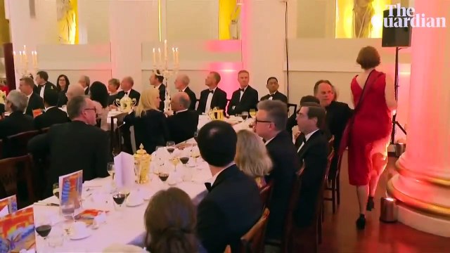 Conservative MP Mark Field grabs climate protester by the neck