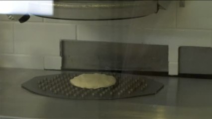 Un robot que hace pizza, lo último en cocina