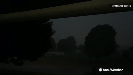 Biting rain and howling winds thrash neighborhood