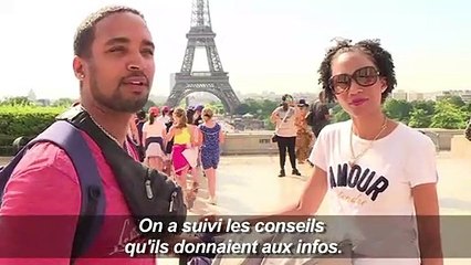Canicule: à Paris, les touristes se protègent du soleil