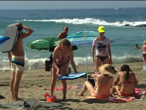 España recibe un 6% más de turistas en julio