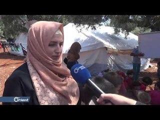 معلمة نازحة تتغلب على ظروف النزوح بتعليم الأطفال القراءة والكتابة - سوريا