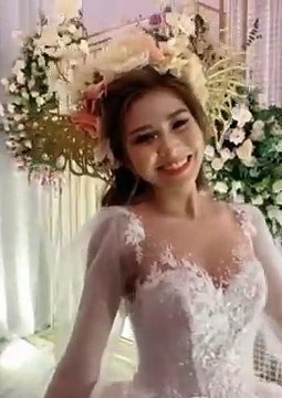 Happy Wedding - This is a lady in Vietnam going through videos and pictures for her big bay!