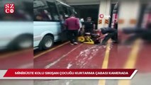 Minibüste kolu sıkışan çocuğu kurtarma çabası kamerada