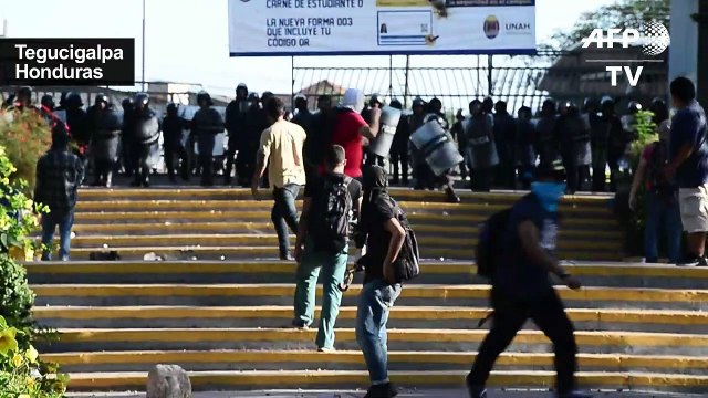 Honduran military police and protesters clash during demonstrations
