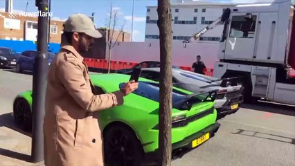 UK Lamborghini driver crashes car after showing off to spectators