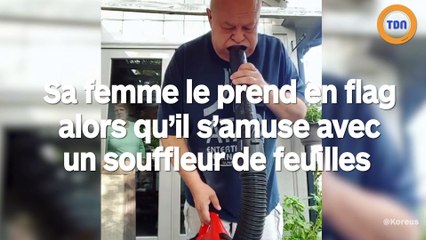 Cet homme est surpris par se femme en train de s'amuser avec un souffleur
