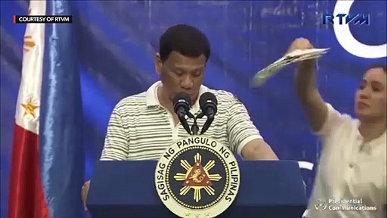 Cockroach lands on Duterte's shoulder
