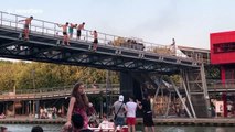 Parisians dive into canal to stay cool during heatwave