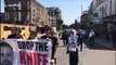 Demonstrators protesting knife crime in London join victim's funeral procession