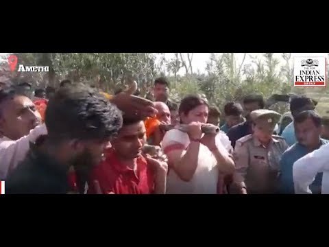 Smriti Irani lends shoulder to carry corpse of slain BJP worker who was killed