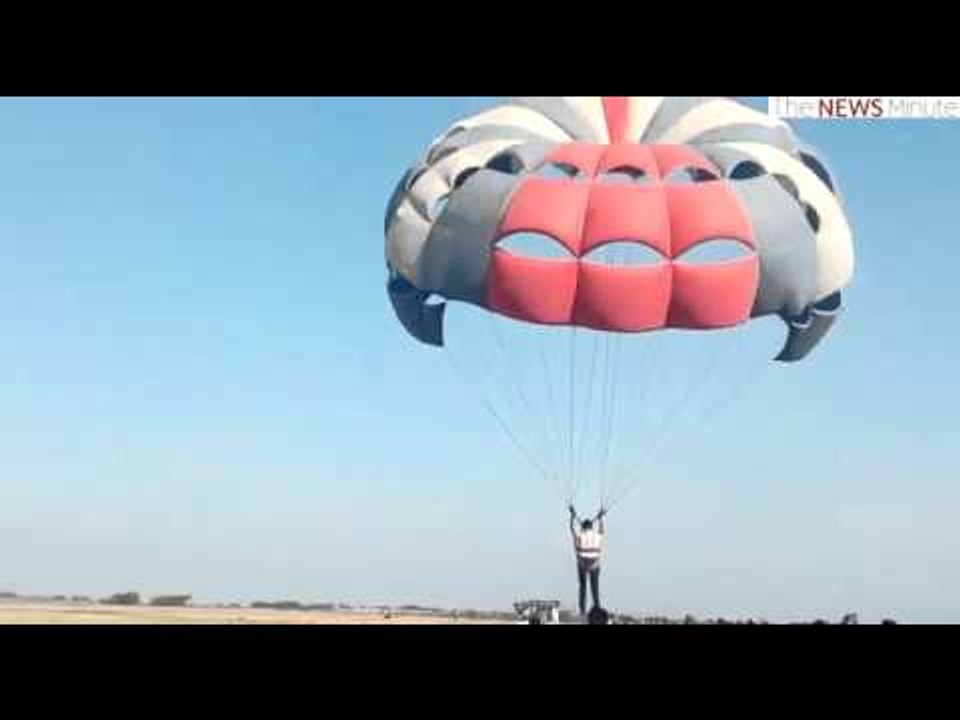 District Collector S Palanisami paraglides to increase awareness in the Nagapattinam district
