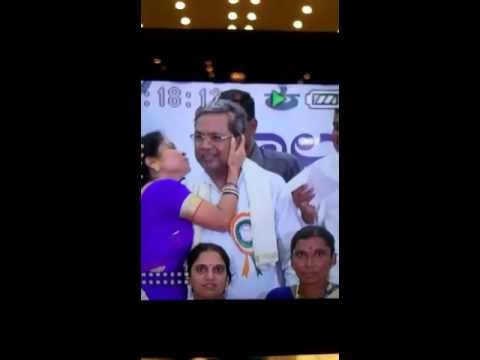 K'taka CM Siddaramaiah being kissed in public by a woman panchayat member
