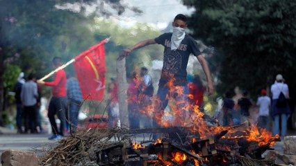 Ten years after coup, Hondurans flee amid violence and repression