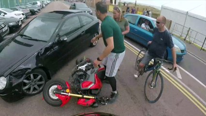 Rider Rolled onto Car's Roof