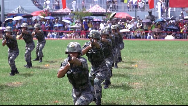 Chinese forces show off power as Hong Kong gears up for protests