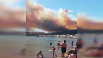 İzmir'deki Çandarlı bölgesinde, yazlık sitelerinin yanında orman yangını çıktı.
