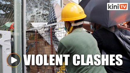 Hong Kong protesters smash windows ahead of handover rally