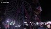 Terrifying scenes as Indonesian fairground goers become stranded on ferris wheel