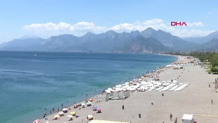 ANTALYA Sahilde eşini döven kişiyi böyle darbettiler