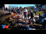 Choque y muerte en la Panamericana: se llevan la mercadería del camión que volcó