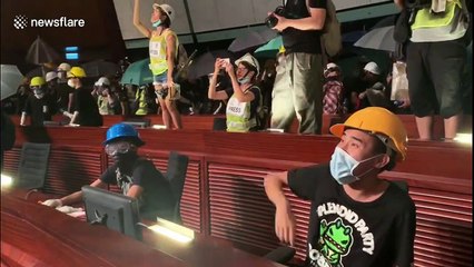 Hong Kong protesters take over legislative chamber
