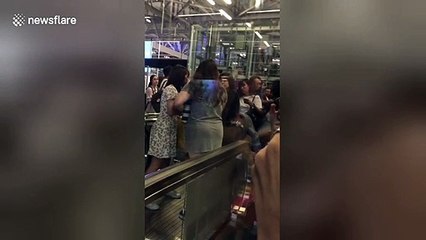 Fans of K-pop act NCT 127 grapple with airport security to enter first-class lounge