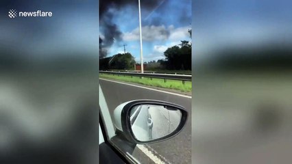 Black smoke pours out of coach that was carrying UK children