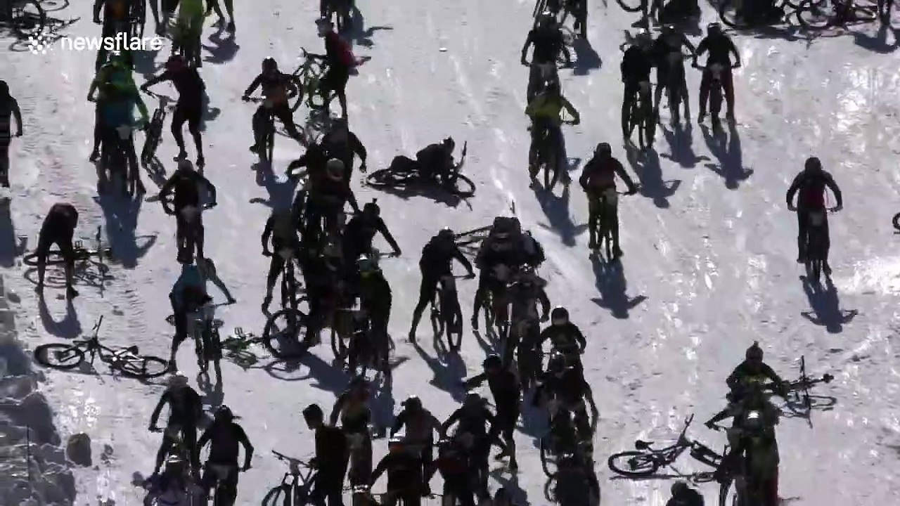 Mountain of Hell bike race sees hundreds of riders crash down icy cliff in French Alps