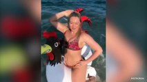 Iskra Lawrence Rocks A Bikini While Riding An Inflatable Chicken In The Ocean