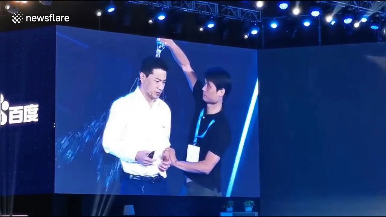 'What's your problem?!' Baidu CEO has water poured over him at event in Beijing