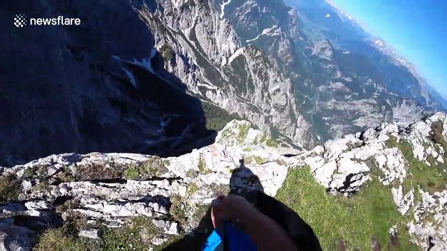Don't look down! Base jumper glides through Austrian valley with epic wingsuit free fall