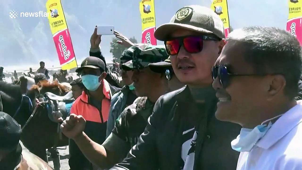 Hundreds of riders take to the sandy plains below Mount Bromo to race their horses