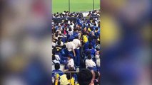 Ce fan de baseball utilise son fils pour cogner sur les supporters adverses !
