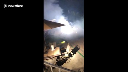 Friends run for their lives when fireworks explode toward them