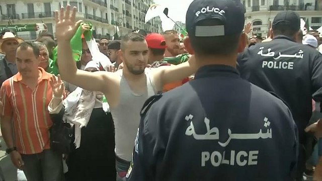 Algerians use independence day celebrations for pro-democracy campaign